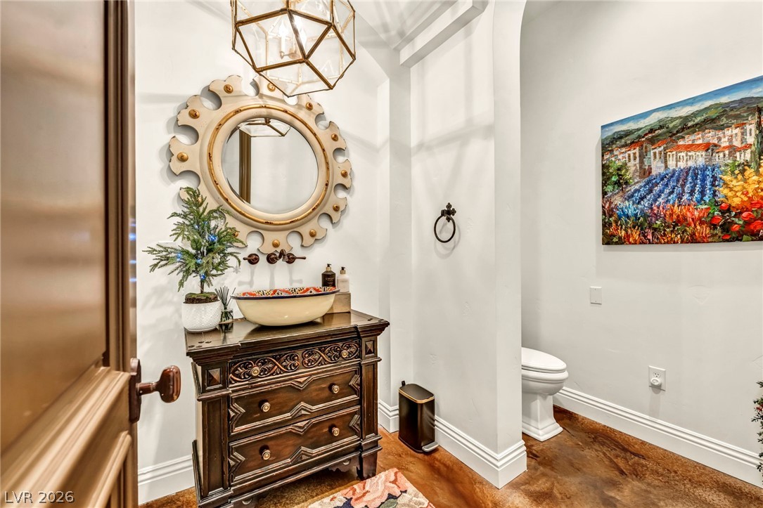 1158 Christian Road Henderson, NV 89002 - Photo 23 of 71 This powder room features unique fixtures and rich flooring.