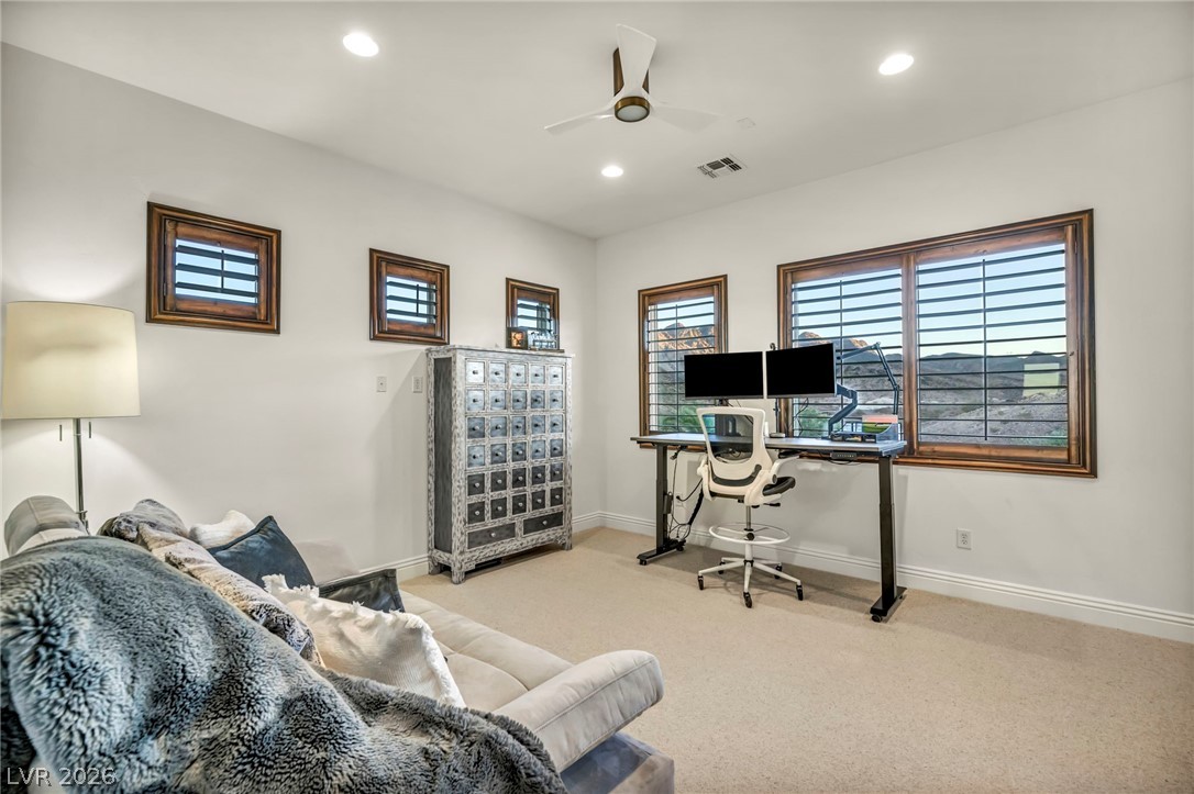 1158 Christian Road Henderson, NV 89002 - Photo 42 of 71 This versatile room offers comfortable living and a productive workspace.