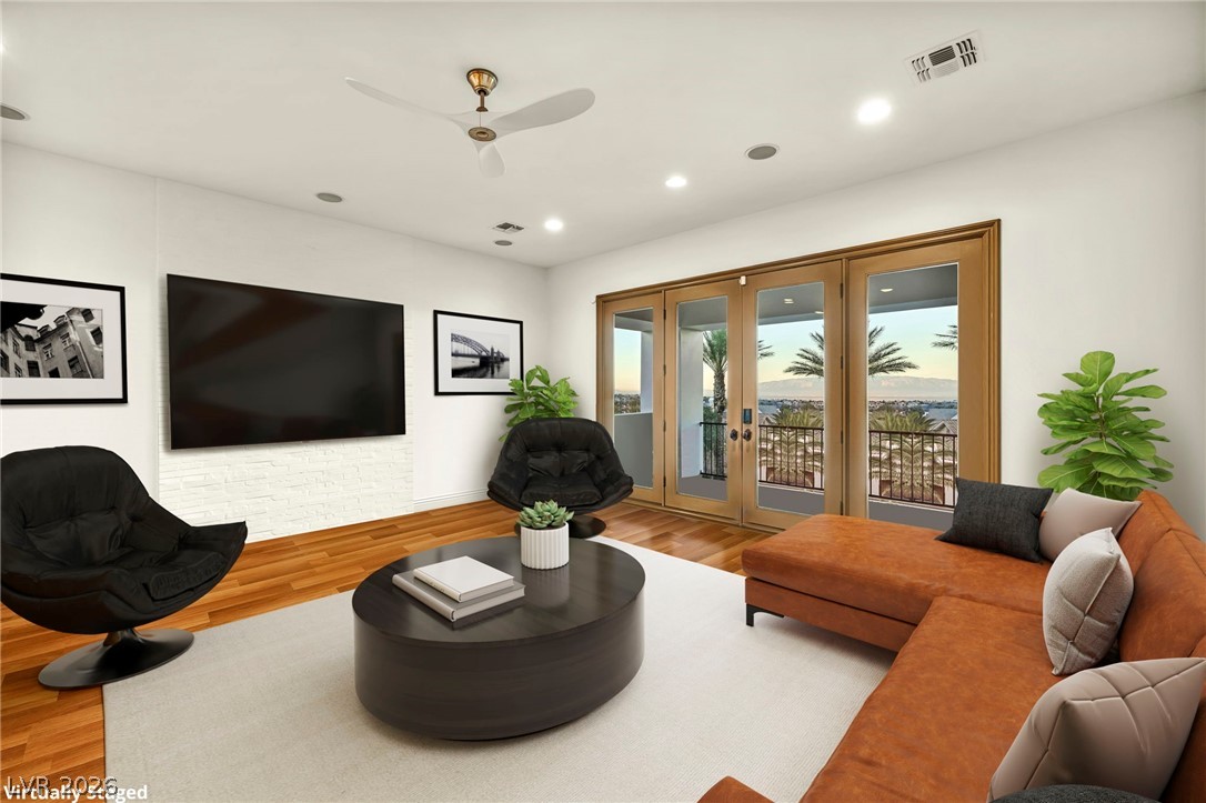 1158 Christian Road Henderson, NV 89002 - Photo 47 of 71 Bright and airy living room with a serene view of distant mountains.