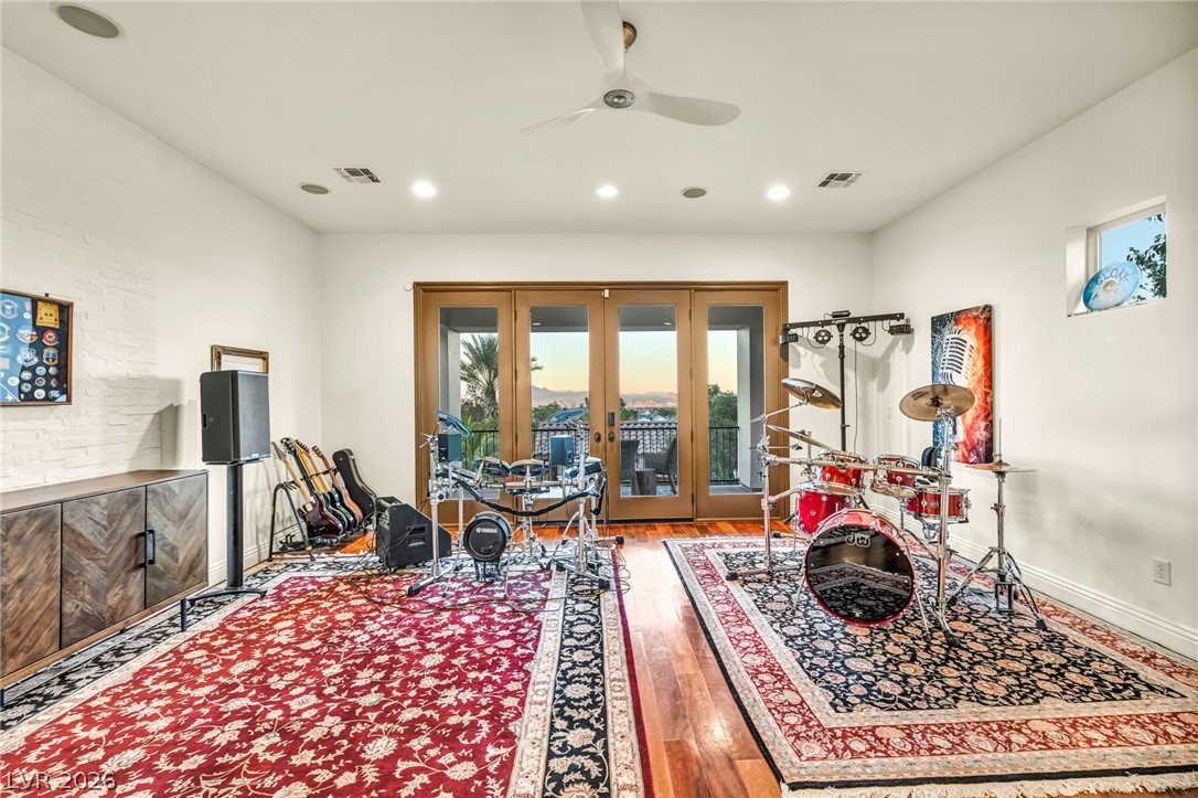 1158 Christian Road Henderson, NV 89002 - Photo 50 of 71 This versatile room features hardwood floors and french doors that open to a scenic view.