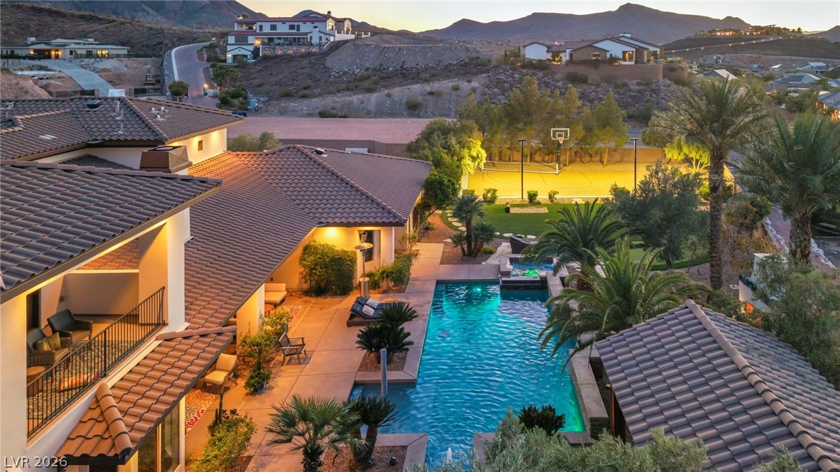 1158 Christian Road Henderson, NV 89002 - Photo 54 of 71 This captivating aerial view showcases a luxurious estate with resort-style amenities.
