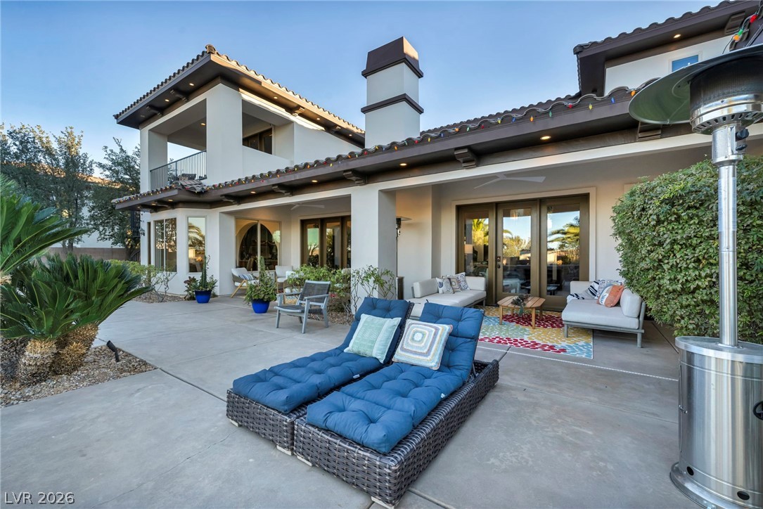 1158 Christian Road Henderson, NV 89002 - Photo 63 of 71 An inviting outdoor living space features a spacious patio, perfect for relaxing or entertaining.
