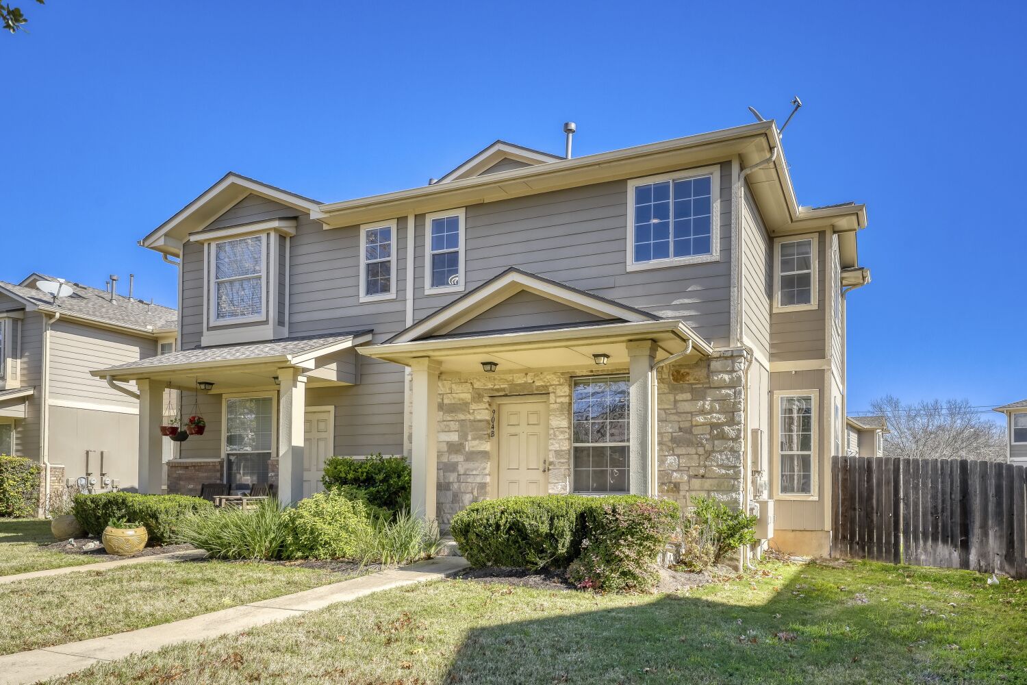 904 Sebastian Bend, Unit B Pflugerville, TX 78660 - Photo 1 of 30 a front view of a house with garden