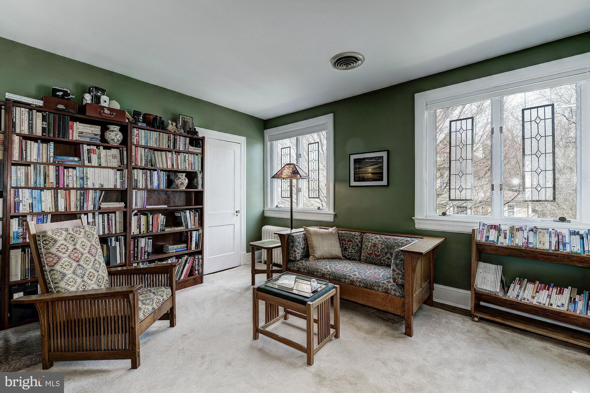 4000 Harrison Street Northwest Washington, DC 20015 - Photo 14 of 23 a living room with furniture and a bookshelf