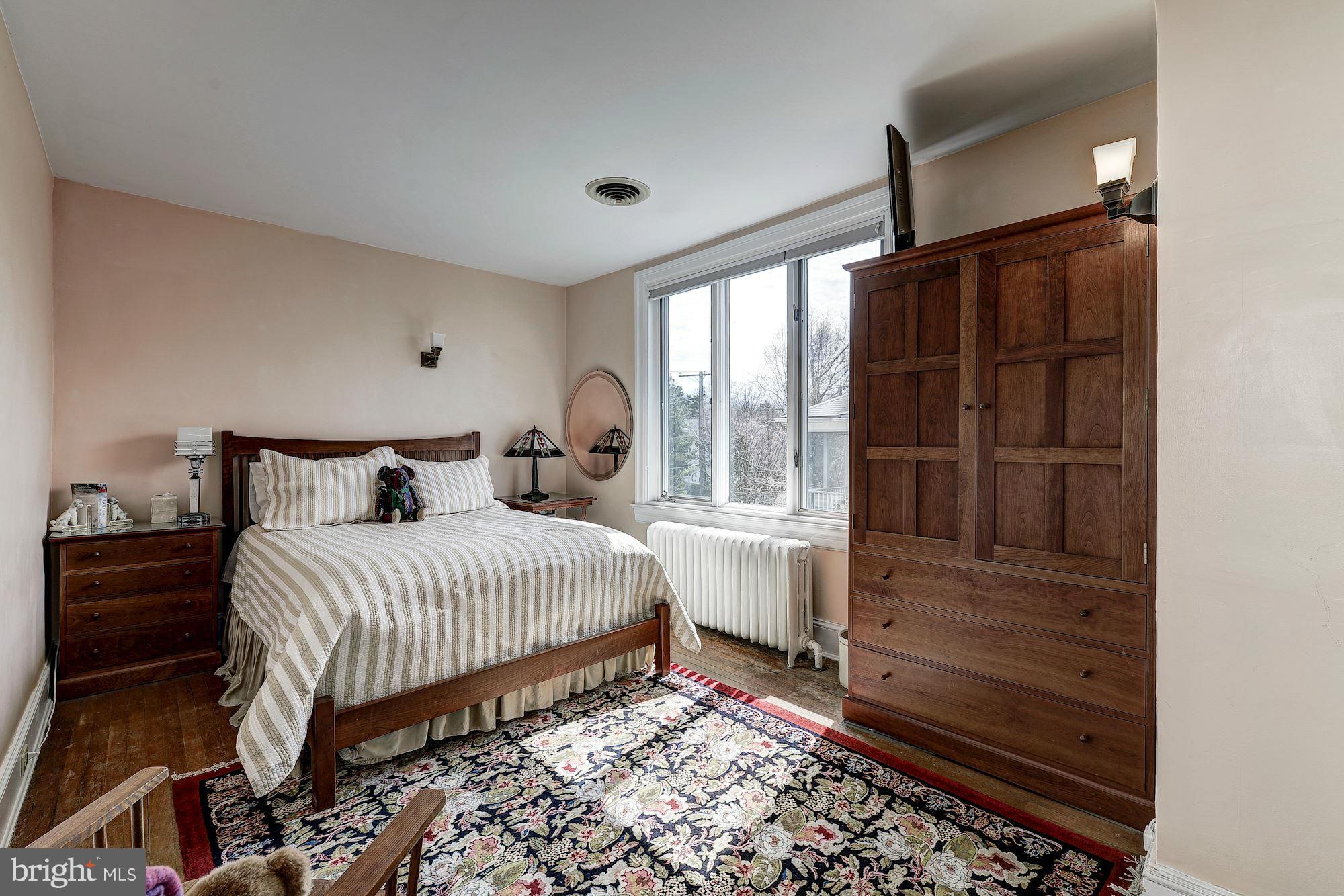 4000 Harrison Street Northwest Washington, DC 20015 - Photo 15 of 23 a bedroom with a bed and a window