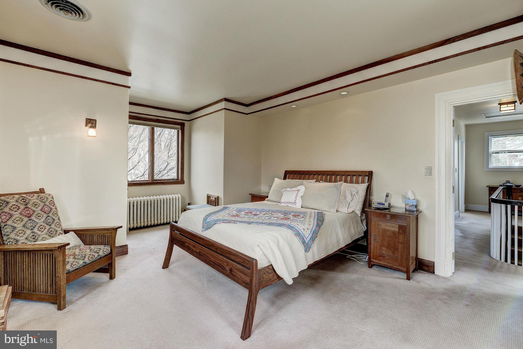 4000 Harrison Street Northwest Washington, DC 20015 - Photo 17 of 23 a spacious bedroom with a bed and window