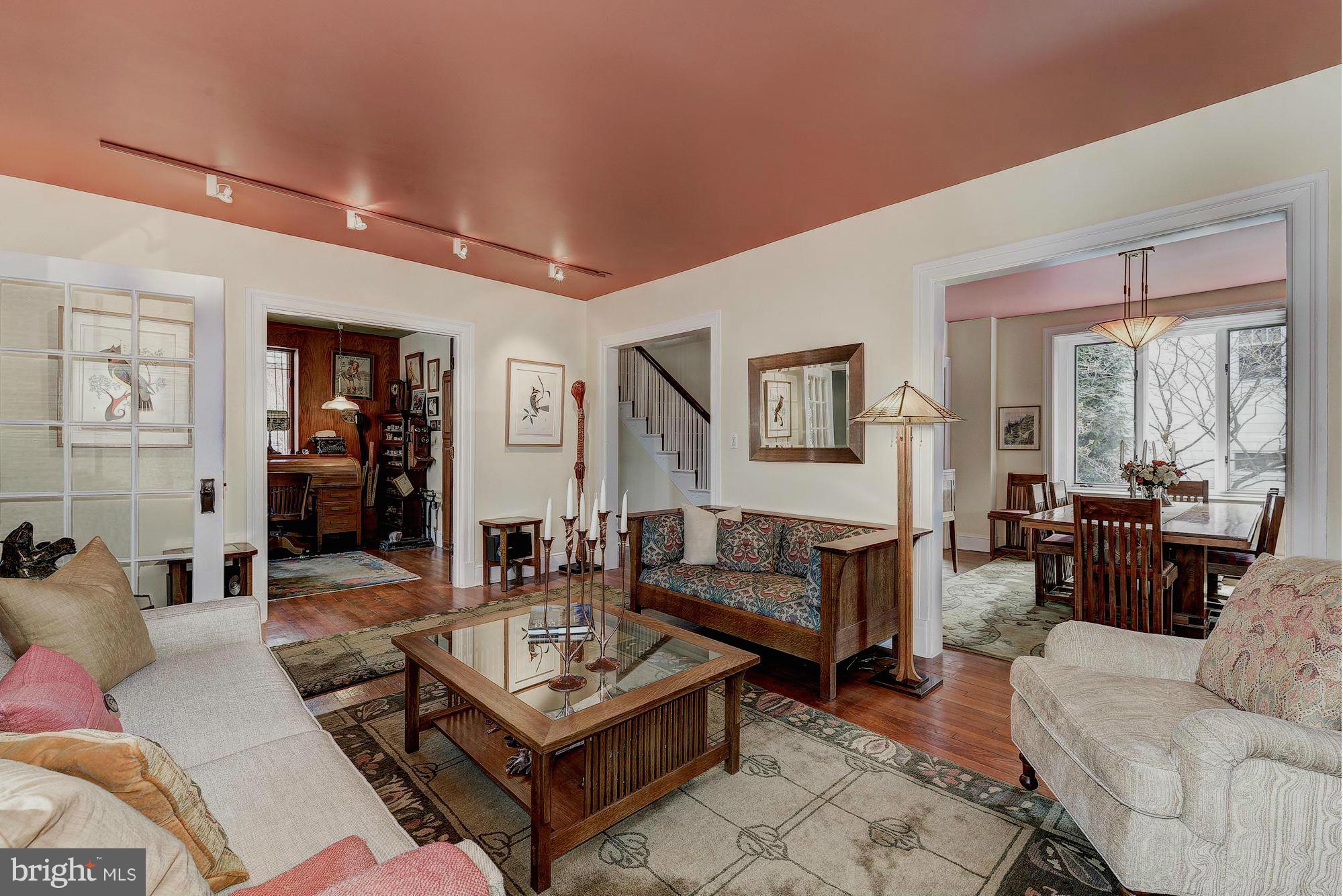 4000 Harrison Street Northwest Washington, DC 20015 - Photo 5 of 23 a living room with furniture a table and a large window
