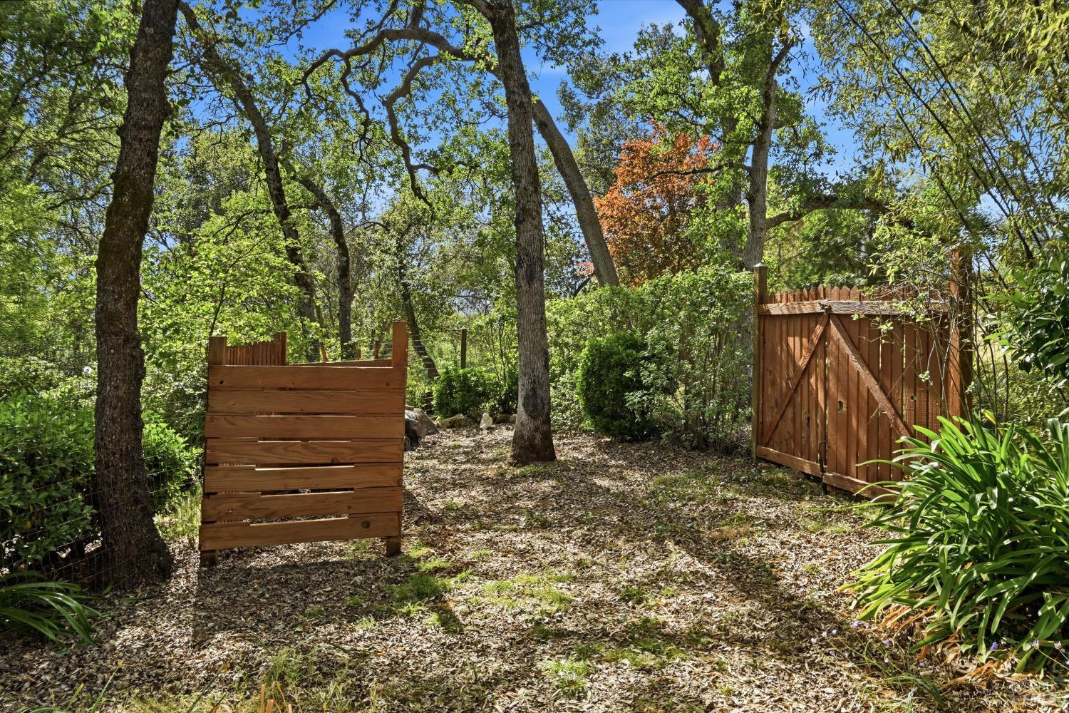 19897 Donkey Hill Road Hidden Valley Lake, CA 95467 - Photo 30 of 45 a backyard of a house with lots of green space