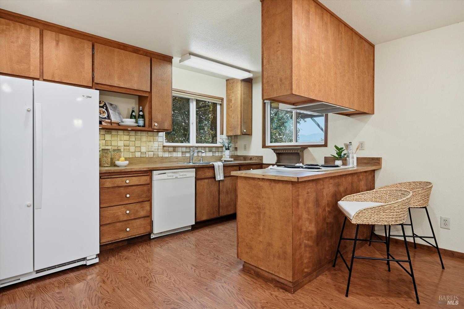 19897 Donkey Hill Road Hidden Valley Lake, CA 95467 - Photo 7 of 45 a kitchen with a sink cabinets and window