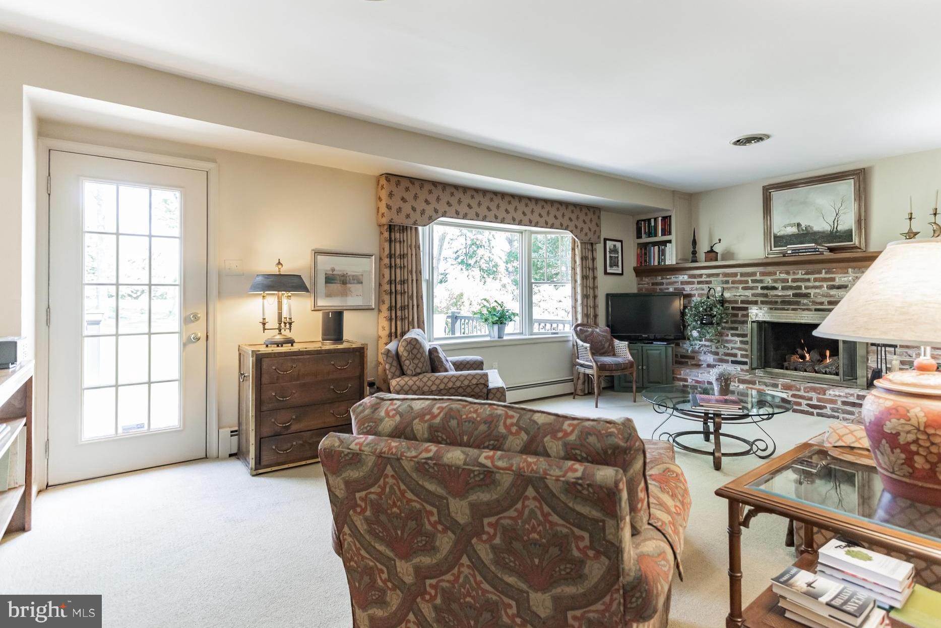 18 East Robin Road Holland, PA 18966 - Photo 9 of 30 Family room with gas fireplace