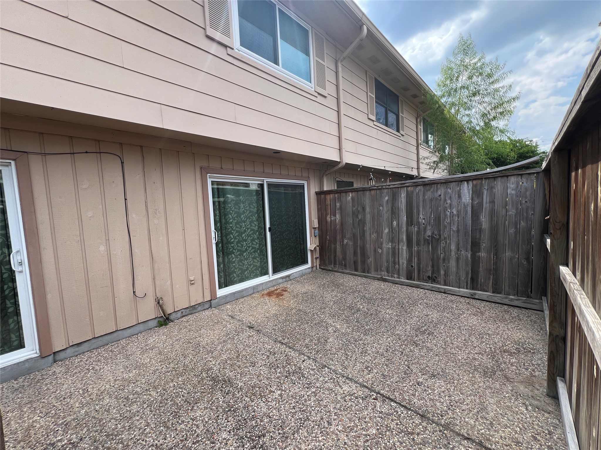 5801 Lumberdale Road, Unit 165 Houston, TX 77092 - Photo 12 of 32 a backyard of a house