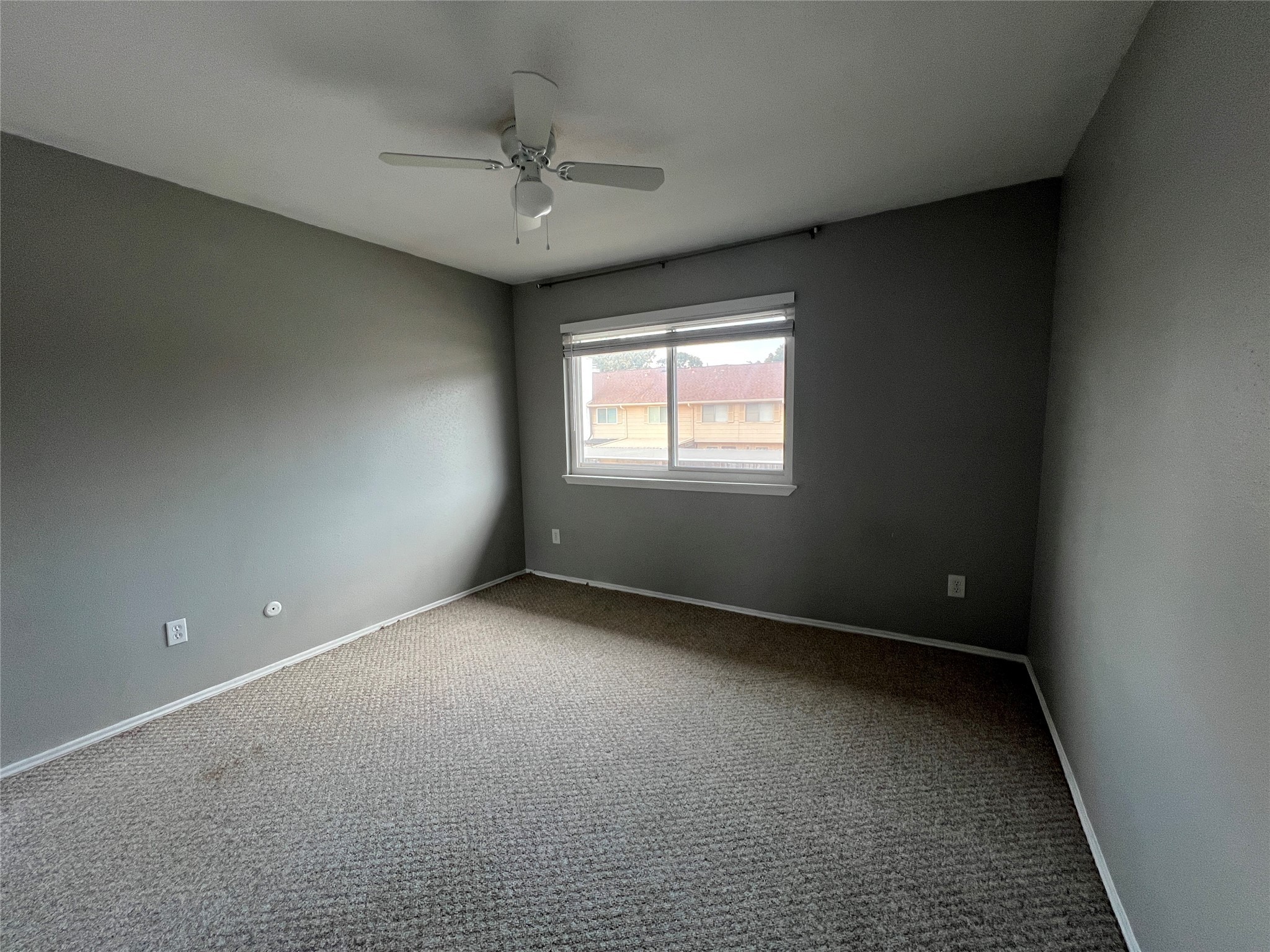 5801 Lumberdale Road, Unit 165 Houston, TX 77092 - Photo 30 of 32 a view of an empty room with a window