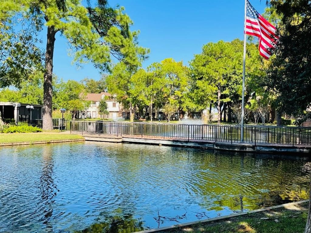 5801 Lumberdale Road, Unit 165 Houston, TX 77092 - Photo 4 of 32 a view of a swimming pool with a patio