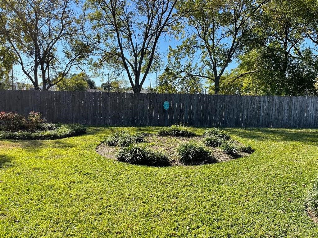 5801 Lumberdale Road, Unit 165 Houston, TX 77092 - Photo 5 of 32 a view of swimming pool with garden