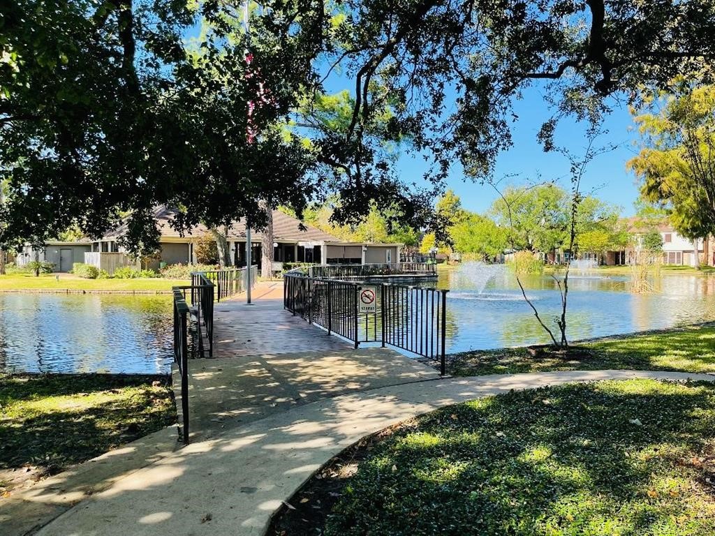 5801 Lumberdale Road, Unit 165 Houston, TX 77092 - Photo 7 of 32 a view of a swimming pool with a patio