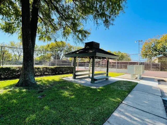 a view of swimming pool with a yard