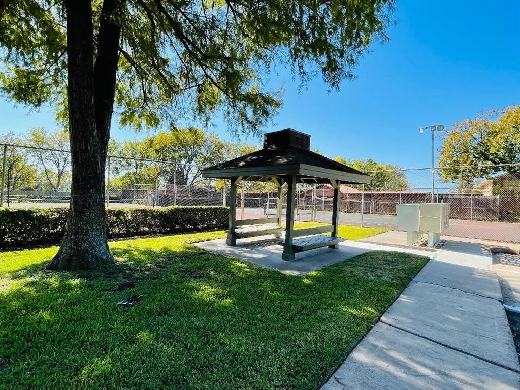 5801 Lumberdale Road, Unit 165 Houston, TX 77092 - Photo 8 of 32 a view of swimming pool with a yard