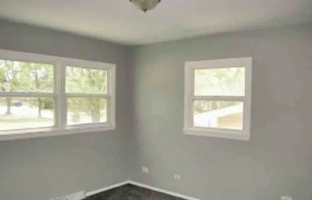 an empty room with a window