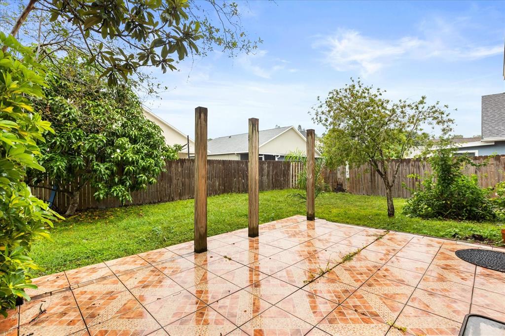 13607 Springtide Court Orlando, FL 32826 - Photo 25 of 32 a view of a road with a house in the background