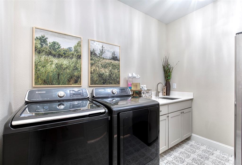 2121 Canyon Lake Road Wills Point, TX 75169 - Photo 24 of 40 a view of a sink with chair and wooden floor