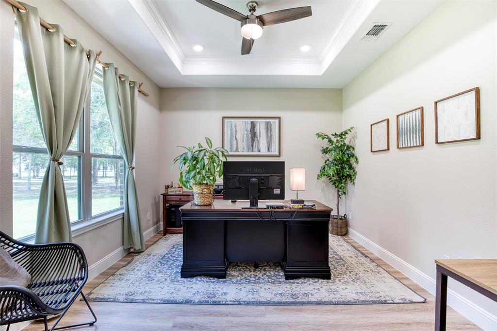 2121 Canyon Lake Road Wills Point, TX 75169 - Photo 7 of 40 a living room with furniture and a fireplace