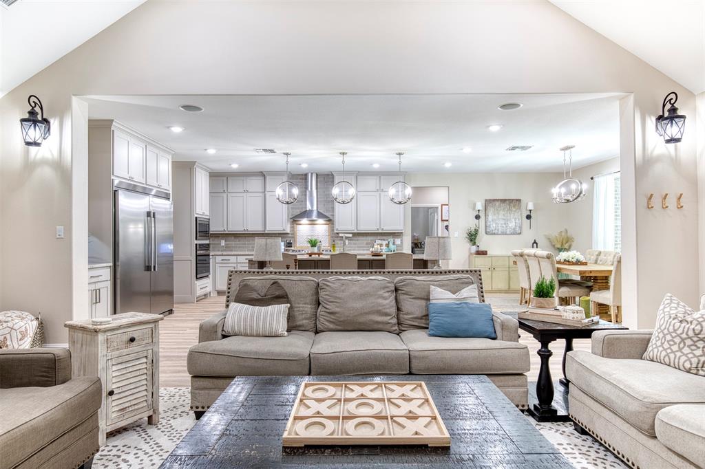 2121 Canyon Lake Road Wills Point, TX 75169 - Photo 9 of 40 a living room with furniture and kitchen view