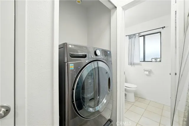 a view of a bathroom with a washer and dryer