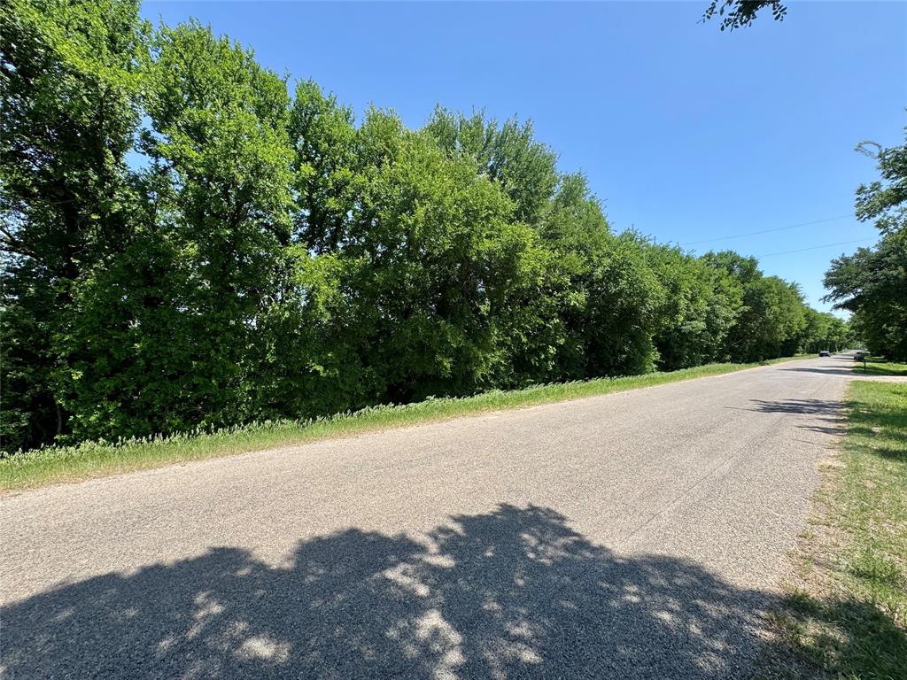 0 Clater Powell Road, Unit LOT 6 Waco, TX 76705 - Photo 2 of 6 a view of a road with a yard