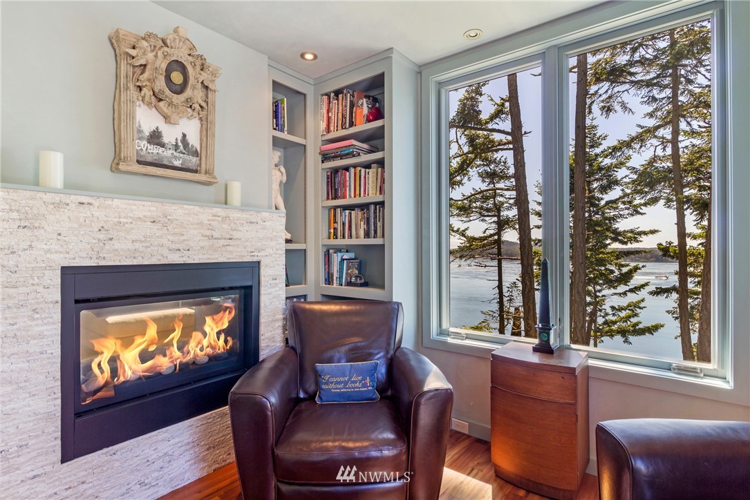 1224 Shark Reef Road Lopez Island, WA 98261 - Photo 22 of 34 a living room with furniture and a fireplace