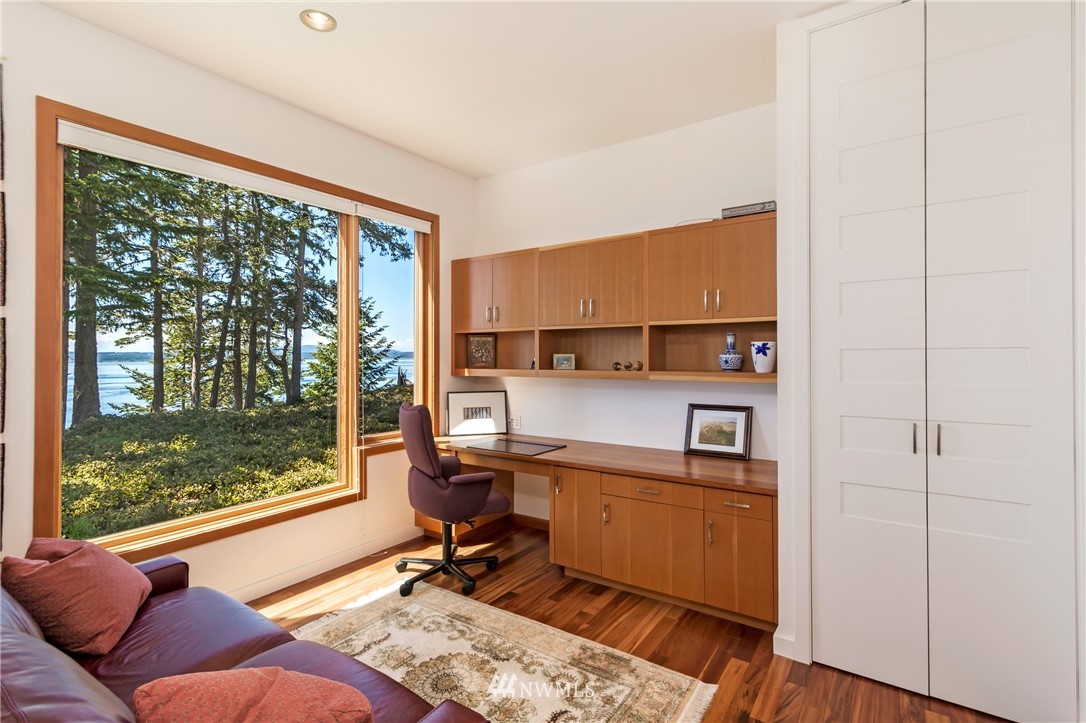 1224 Shark Reef Road Lopez Island, WA 98261 - Photo 4 of 34 a view of a workspace with furniture and a window