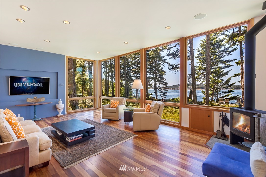 1224 Shark Reef Road Lopez Island, WA 98261 - Photo 5 of 34 a living room with furniture and a large window