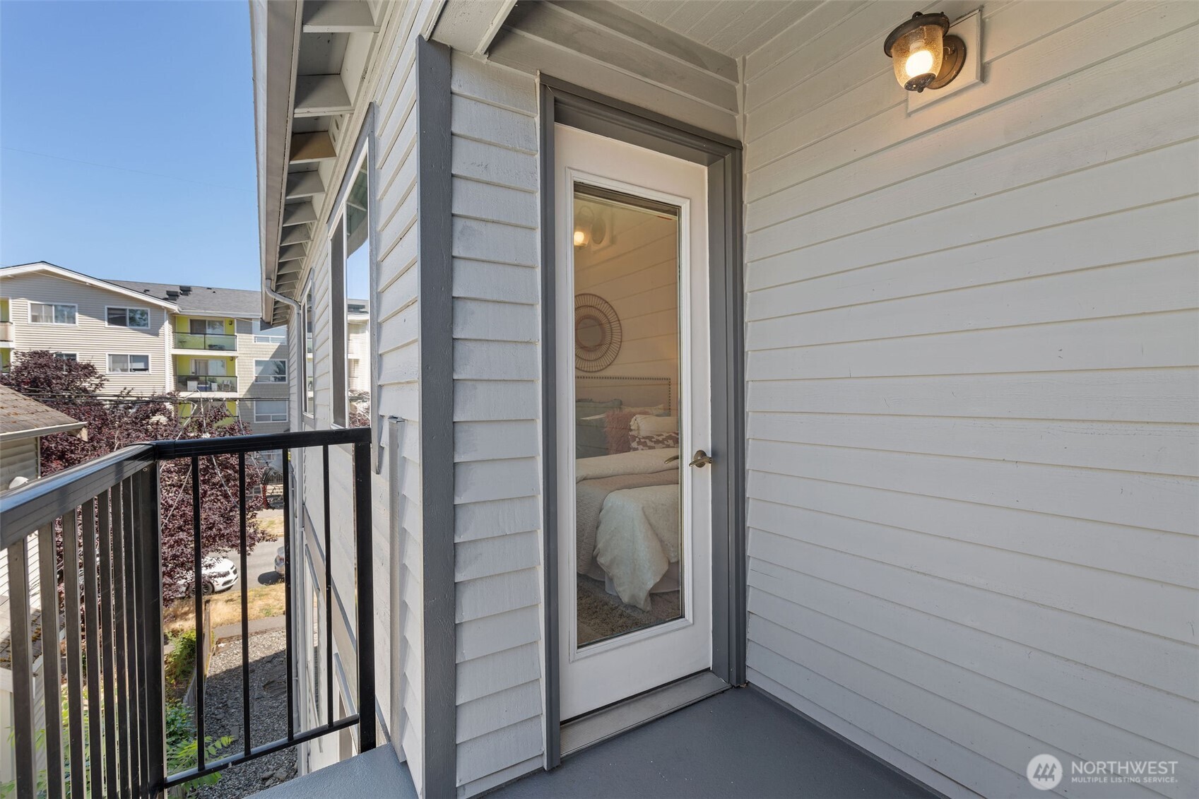 1125 North 93rd Street, Unit 6 Seattle, WA 98103 - Photo 24 of 35 a view of balcony and door