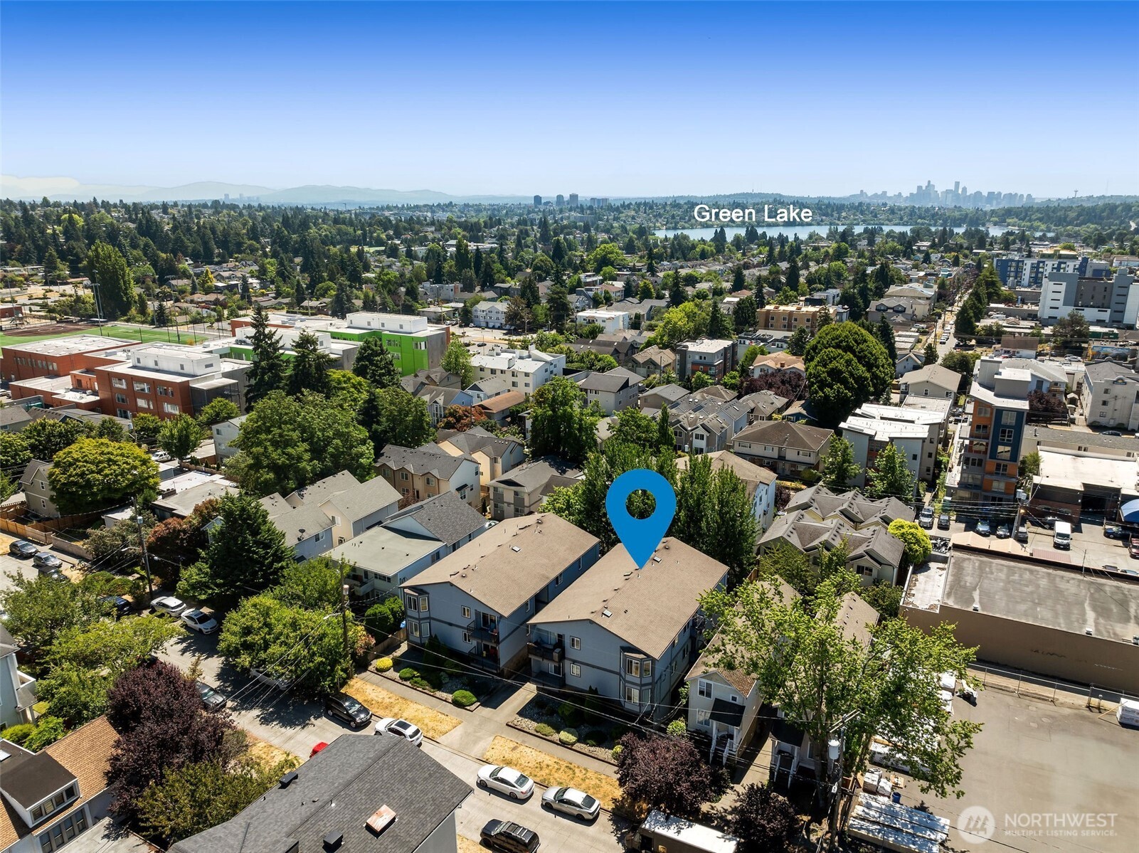 1125 North 93rd Street, Unit 6 Seattle, WA 98103 - Photo 34 of 35 an aerial view of a house with a yard