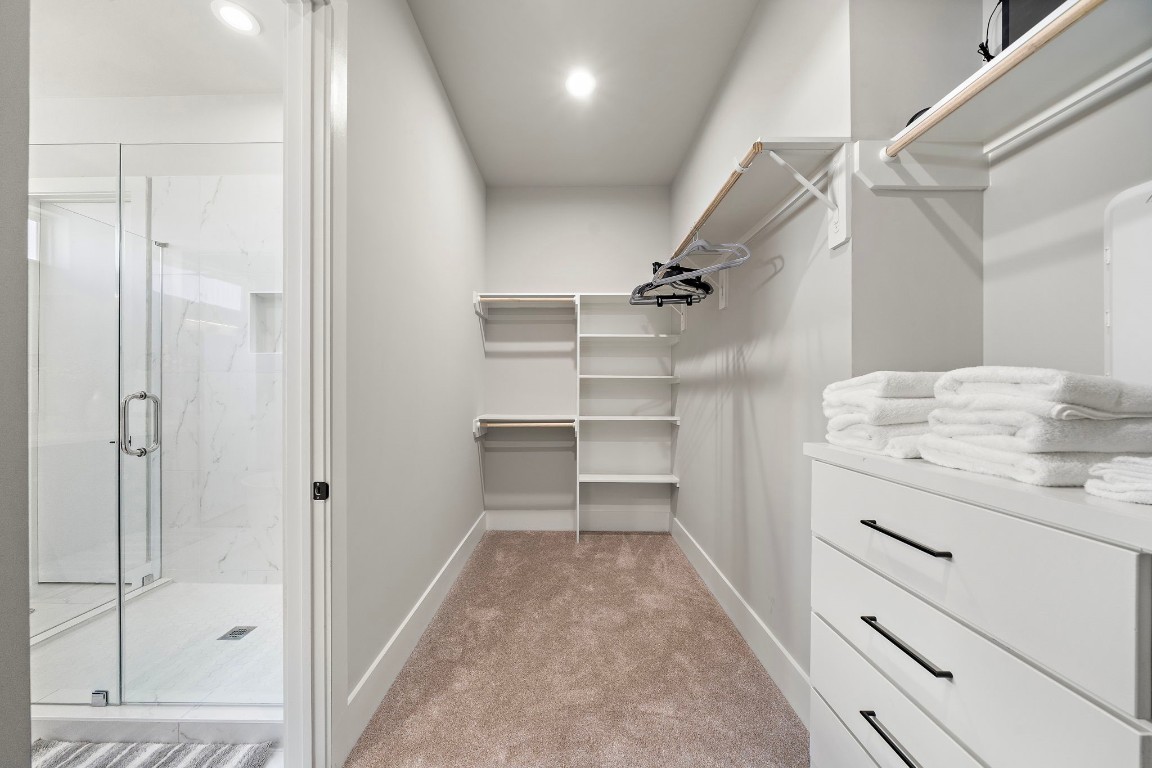 3515 Hutchins Street Houston, TX 77004 - Photo 25 of 35 a view of a walk in closet and bedroom