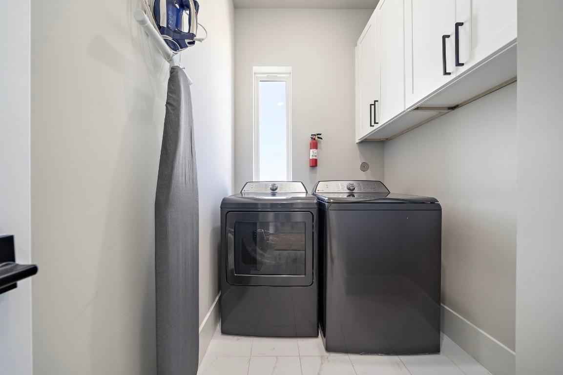 3515 Hutchins Street Houston, TX 77004 - Photo 32 of 35 a utility room with dryer and washer