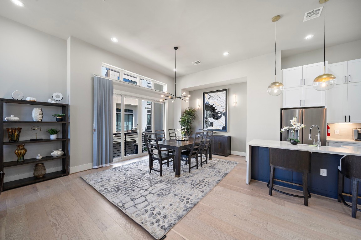 3515 Hutchins Street Houston, TX 77004 - Photo 4 of 35 a view of a dining room with furniture window and wooden floor