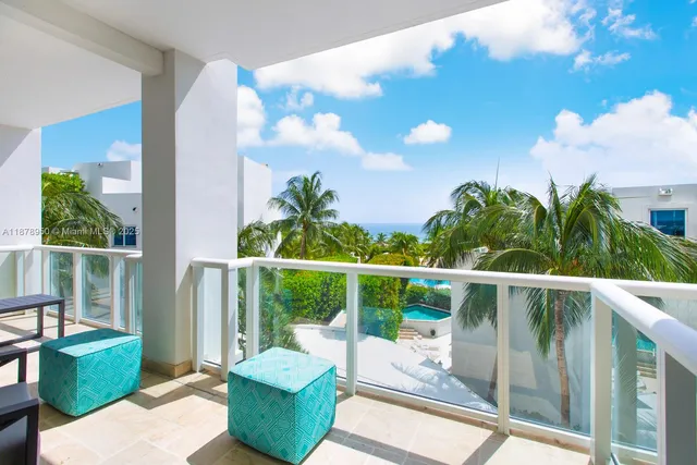 a backyard of a house with outdoor seating