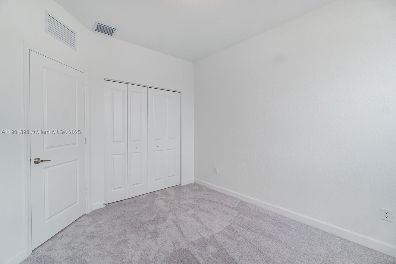 207 Southwest 159th Terrace Pembroke Pines, FL 33027 - Photo 25 of 37 a view of an empty room
