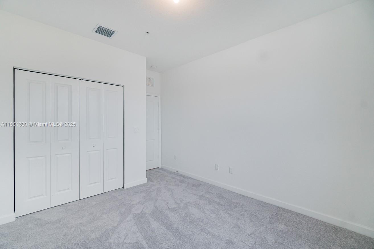 207 Southwest 159th Terrace Pembroke Pines, FL 33027 - Photo 28 of 37 a view of an empty room