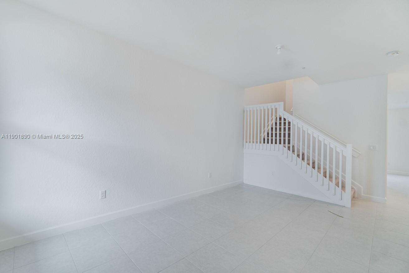 207 Southwest 159th Terrace Pembroke Pines, FL 33027 - Photo 6 of 37 a view of a hallway