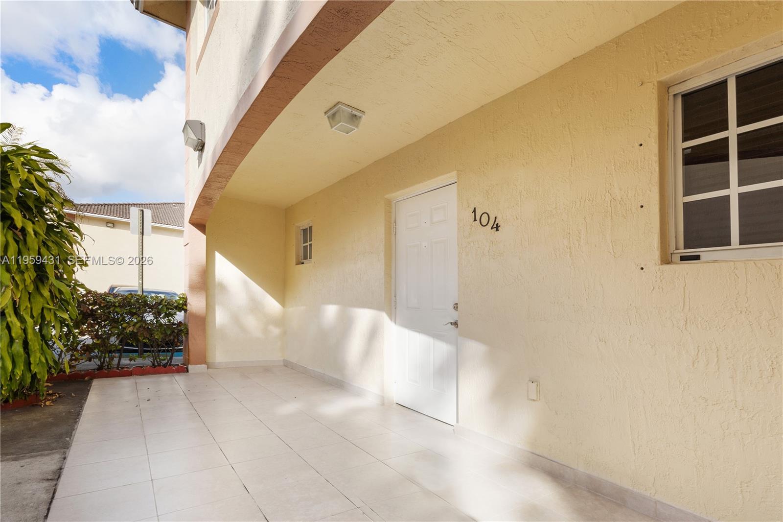 6765 Northwest 182nd Street, Unit 104 Hialeah, FL 33015 - Photo 23 of 24 a view of entryway and hall
