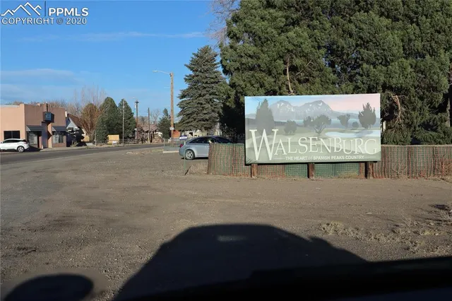 a view of a city street with a building