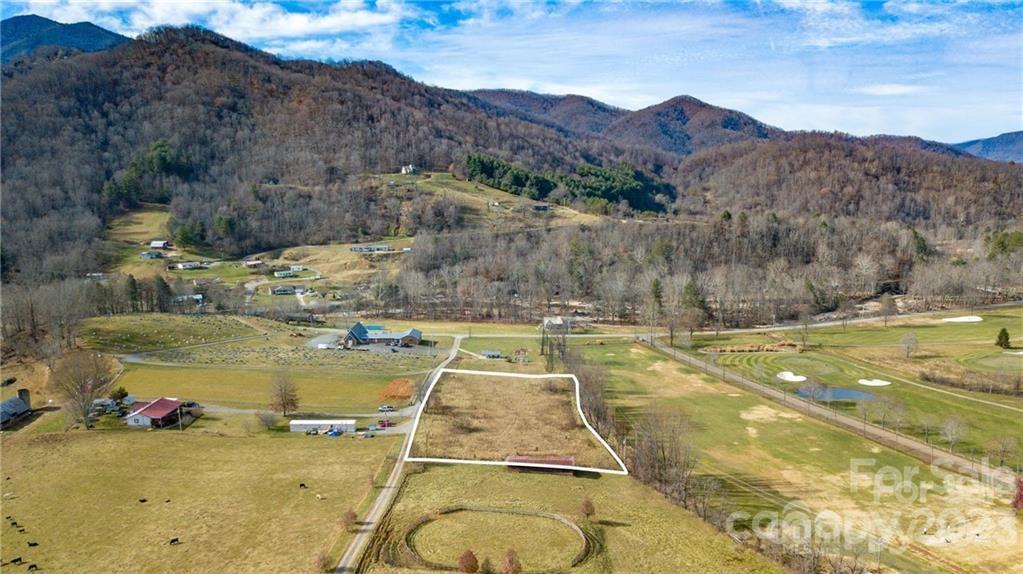 Tbd Cherokee Trail Canton, NC 28716 - Photo 2 of 12 a view of a swimming pool with mountains in the background