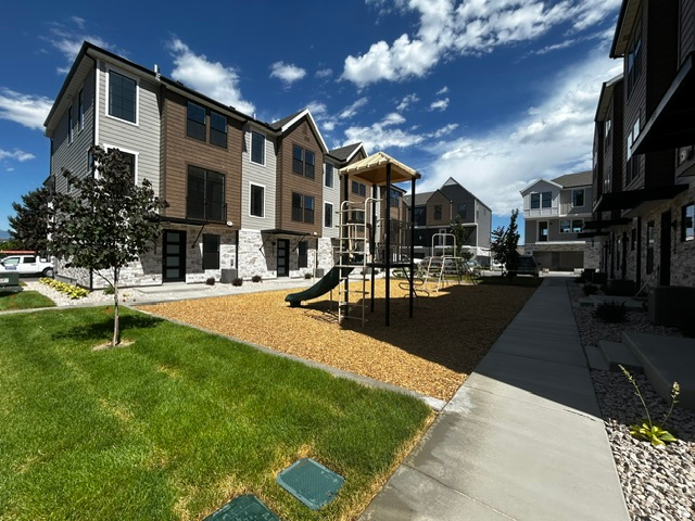 7331 South Sideline Lane, Unit 58 Midvale, UT 84047 - Photo 25 of 29 Contemporary townhomes featuring multi-textured facades with stone and siding
