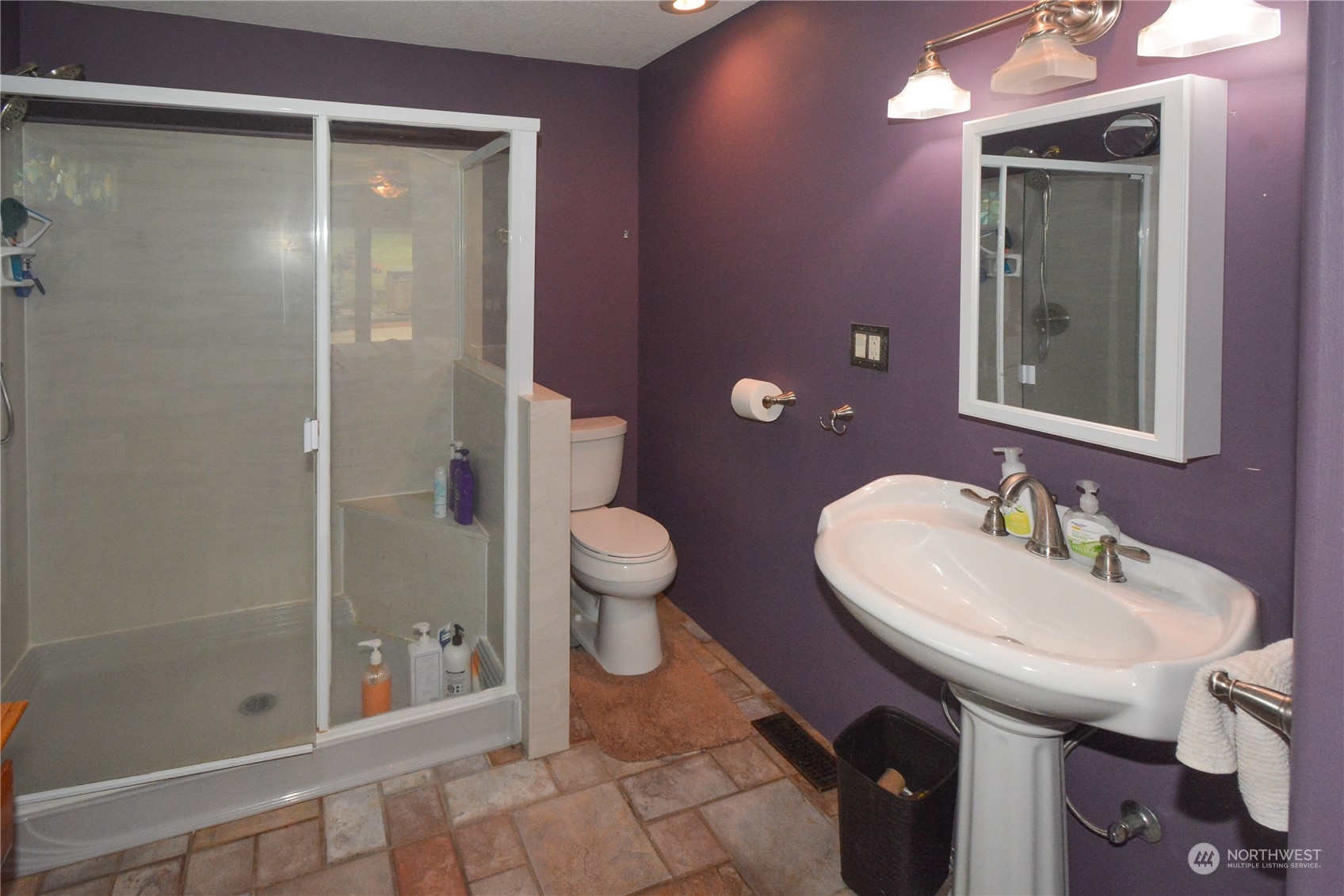307 Lost Valley Road Curtis, WA 98538 - Photo 15 of 27 a bathroom with a sink a toilet and shower