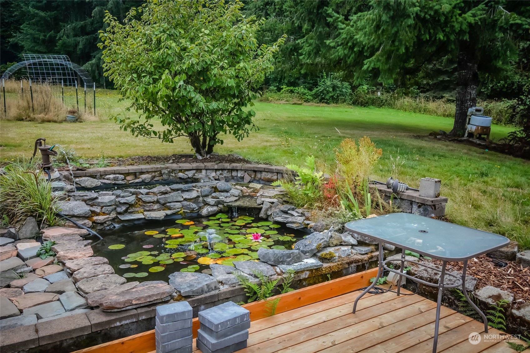 307 Lost Valley Road Curtis, WA 98538 - Photo 19 of 27 a view of a chairs and table in the garden