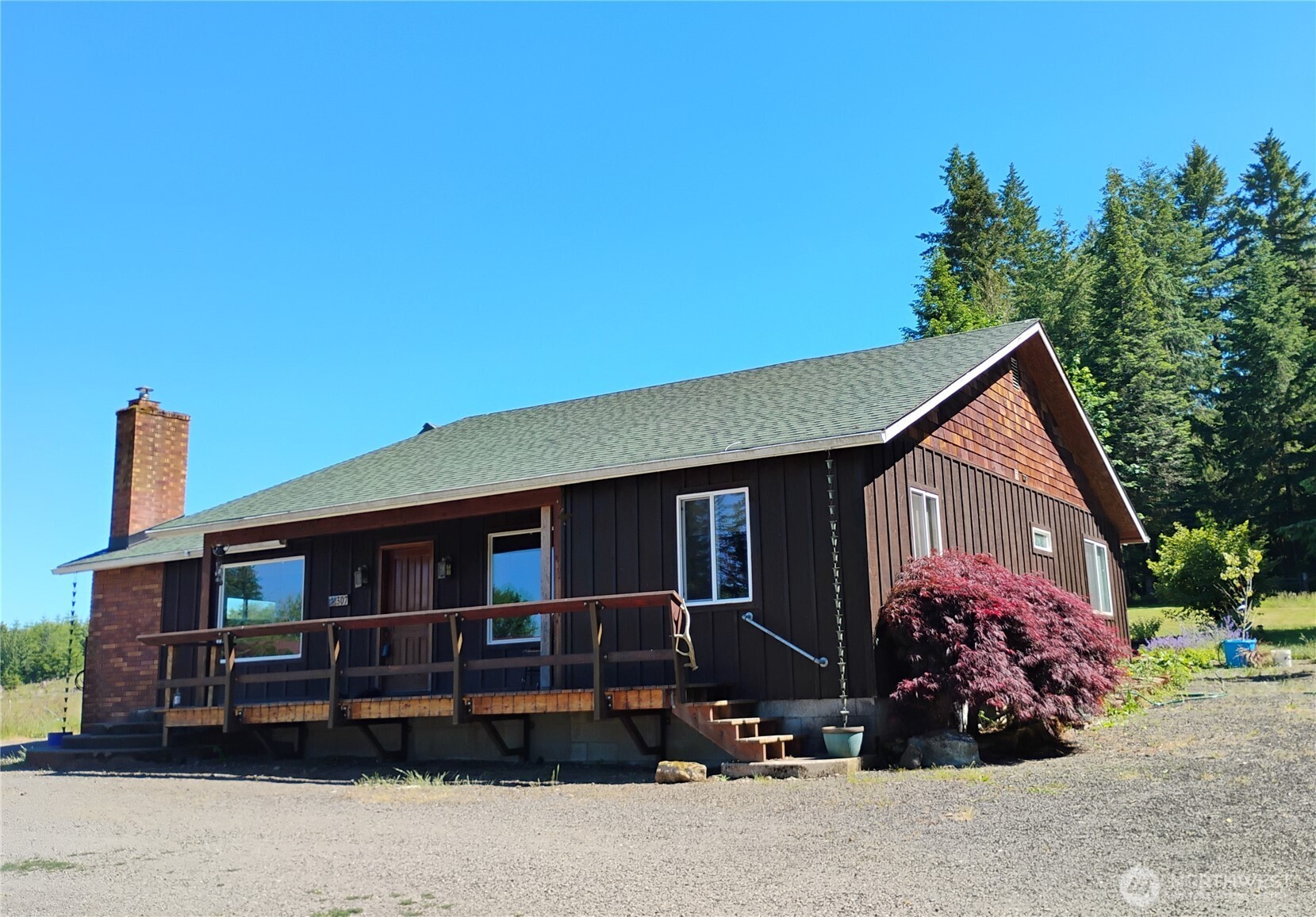 307 Lost Valley Road Curtis, WA 98538 - Photo 26 of 27 a front view of a house with a yard