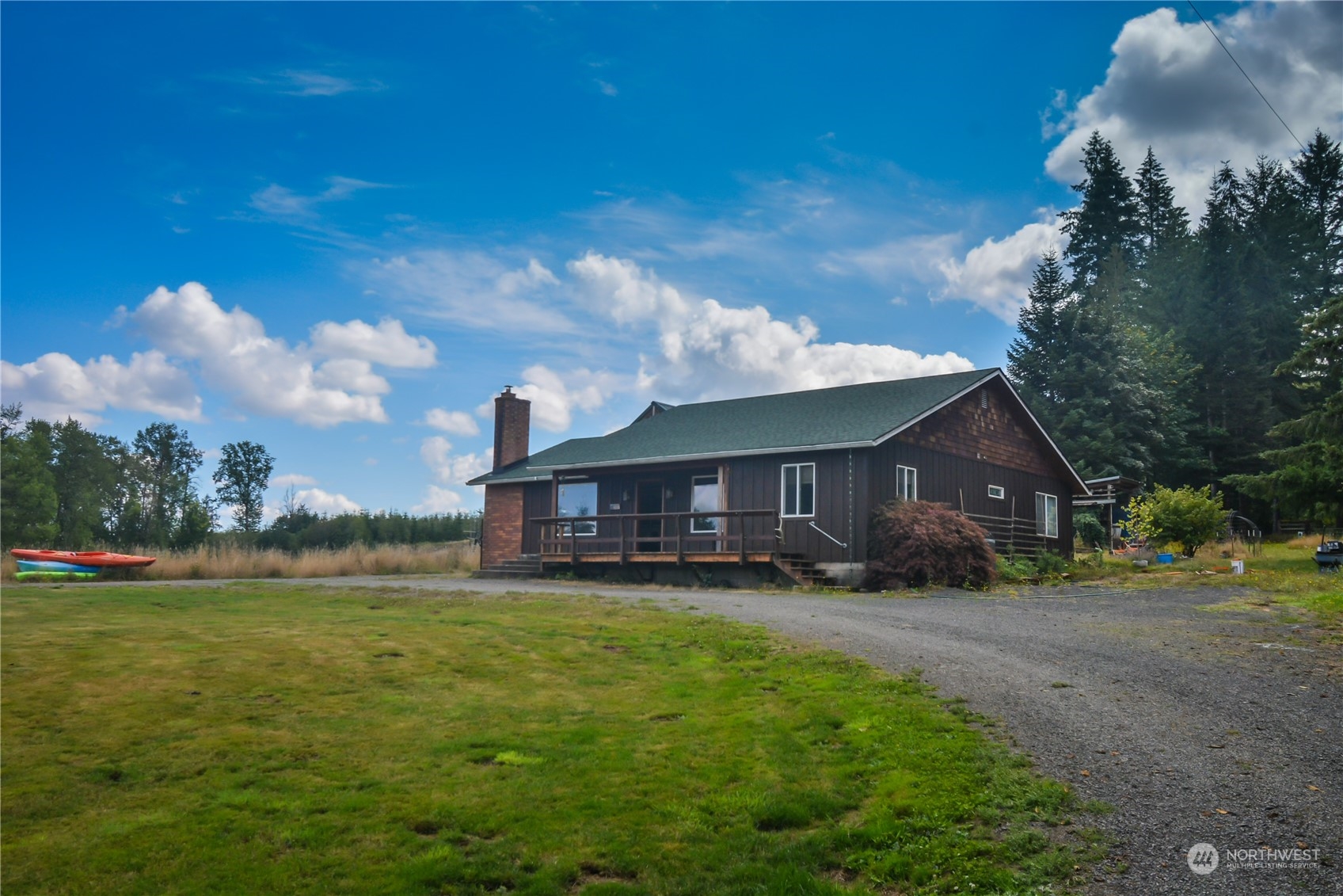 307 Lost Valley Road Curtis, WA 98538 - Photo 27 of 27 a view of a house with a yard