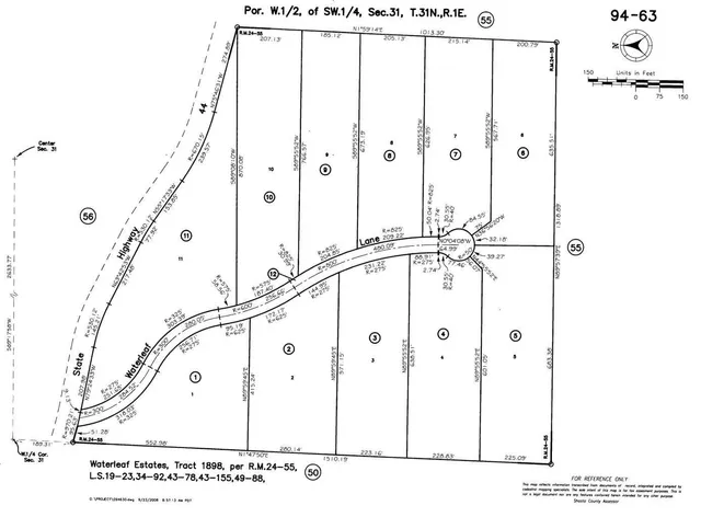 a picture of a room with a white walls and a large window