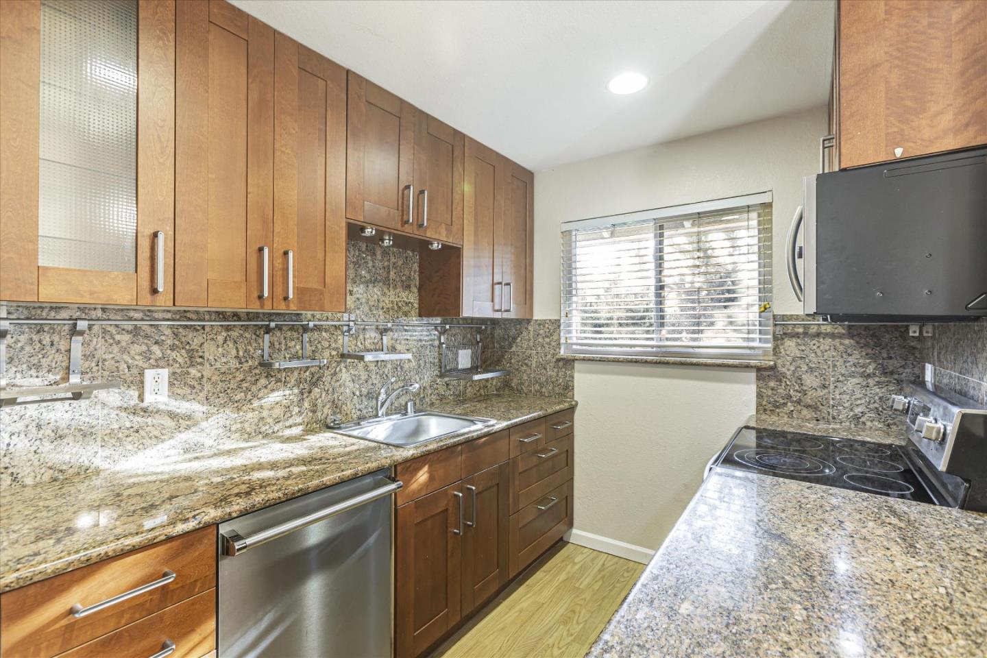 4260 Clayton Road, Unit 20 Concord, CA 94521 - Photo 1 of 35 a kitchen with stainless steel appliances granite countertop a sink stove and cabinets
